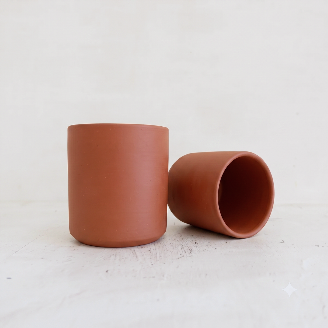 Terracotta Cermamic cup on white background