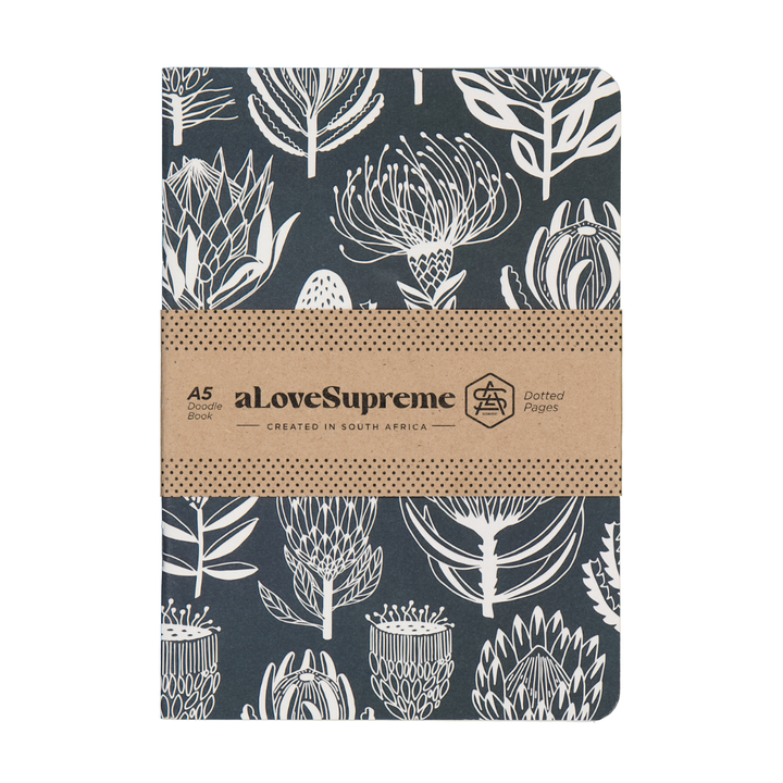 Notebook with floral pattern and brown band featuring &