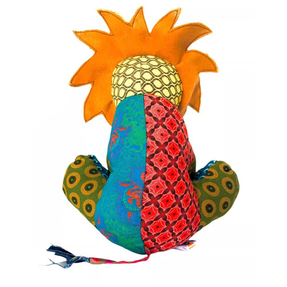 back of Lion Shweshwe Stuffed Toy, with colourful fabric on white background