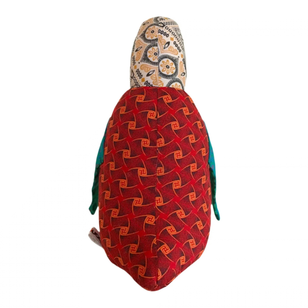Back of Penguine Shweshwe Stuffed Toy, with colourful fabric on white background