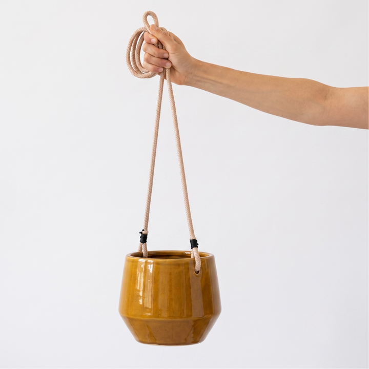 Pogo Hanging Planter - Burnt Mustard 16cm handheld for scale