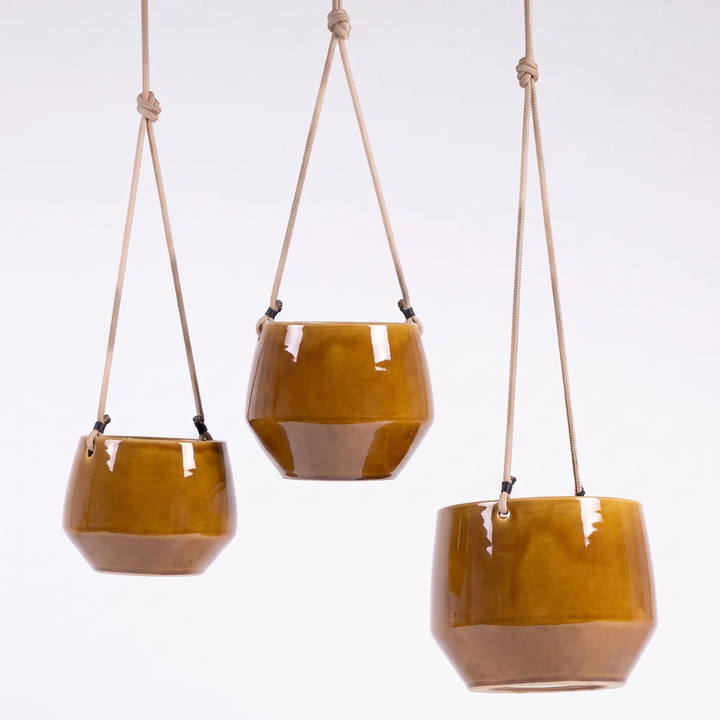 three sizes of burnt mustard planter by plantify