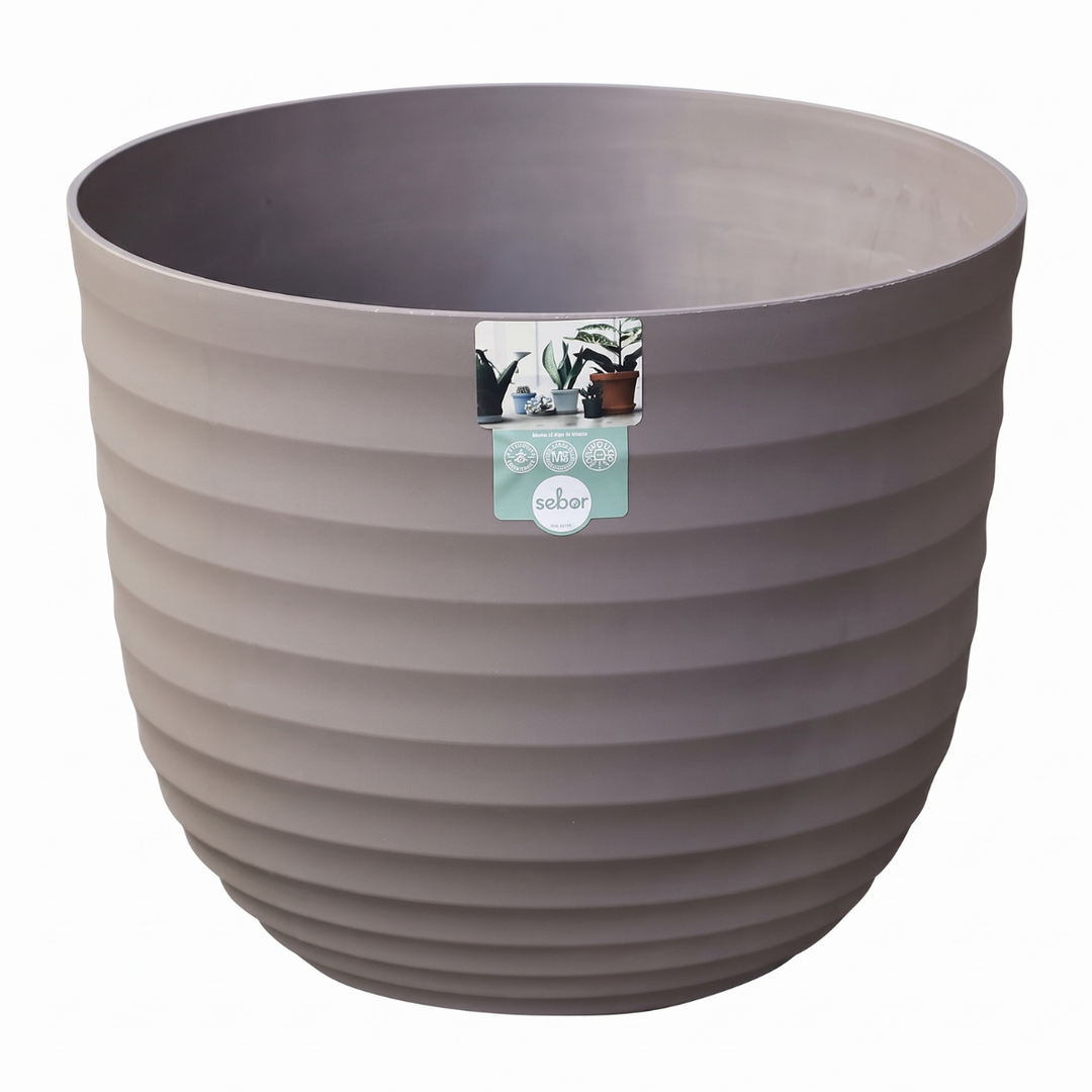 Dark beige plastic planter with texture on white background